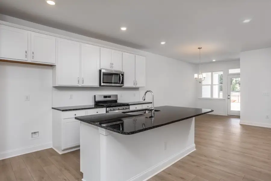 Furnished interior view inside a new home in Enclave at Traditions Townhomes, Wake Forest (Image 6).