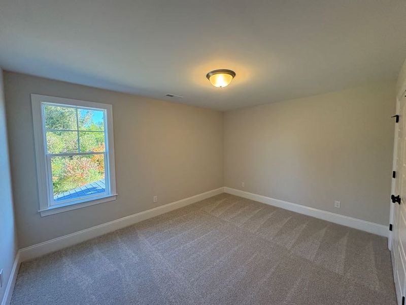 Spacious, unfurnished interior of a new home in Riverside Cove, Wilmington (Image 31).