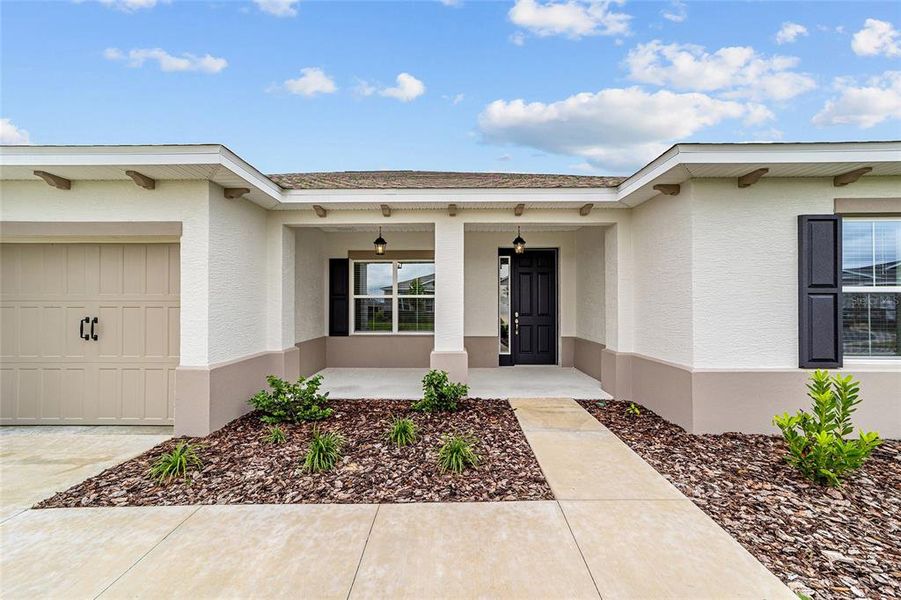 Exterior details and patio area of a home in On Top of the World Communities, Ocala (Image 23).