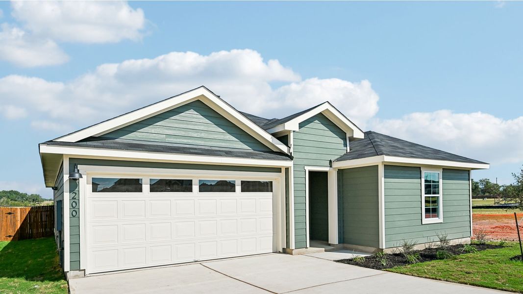 Front exterior of a new home in Watermill, Uhland, TX, highlighting curb appeal (Image 2). Front exterior of a new home in Watermill, Uhland, TX, highlighting curb appeal (Image 2).