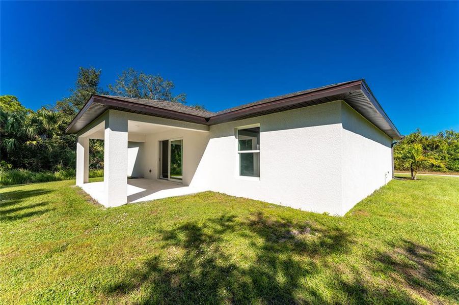 Exterior details and patio area of a home in , North Port (Image 26).
