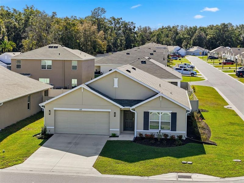 Front exterior of a new home in , Belleview, FL, highlighting curb appeal (Image 2). Front exterior of a new home in , Belleview, FL, highlighting curb appeal (Image 2).