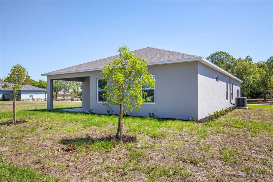 Exterior details and patio area of a home in Burnt Store Village, Punta Gorda (Image 3).
