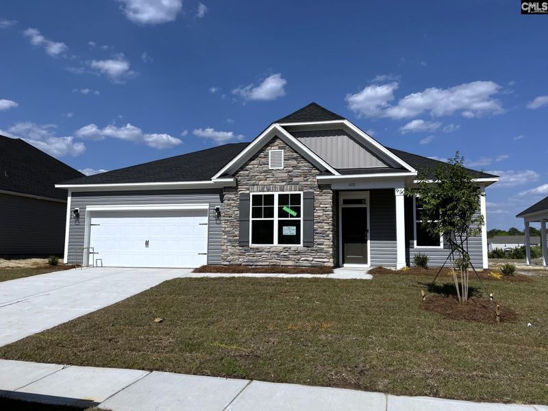 Front exterior of a new home in Blythewood Farms, Blythewood, SC, highlighting curb appeal (Image 1). Front exterior of a new home in Blythewood Farms, Blythewood, SC, highlighting curb appeal (Image 1).