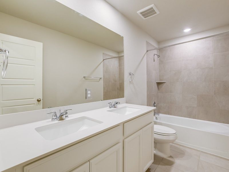 Furnished interior view inside a new home in Remington Ranch, San Antonio (Image 11).