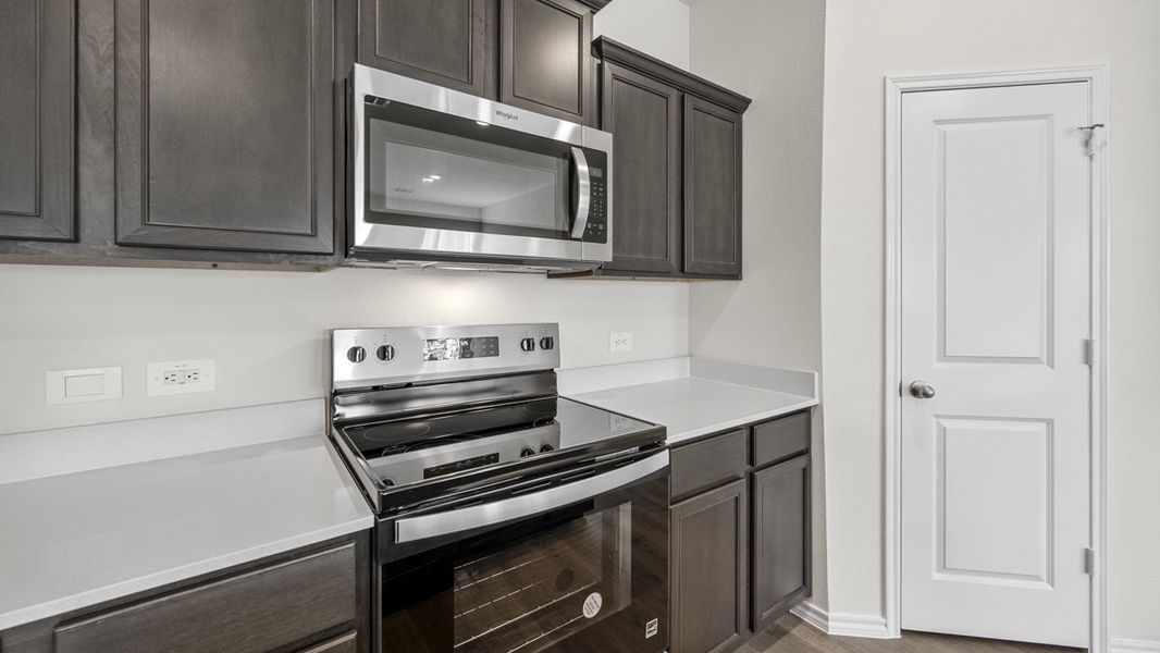 Furnished interior view inside a new home in Crane Crossing, Crandall (Image 6).