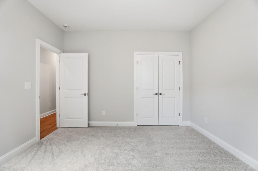 Spacious, unfurnished interior of a new home in Rone Creek, Waxhaw (Image 73).