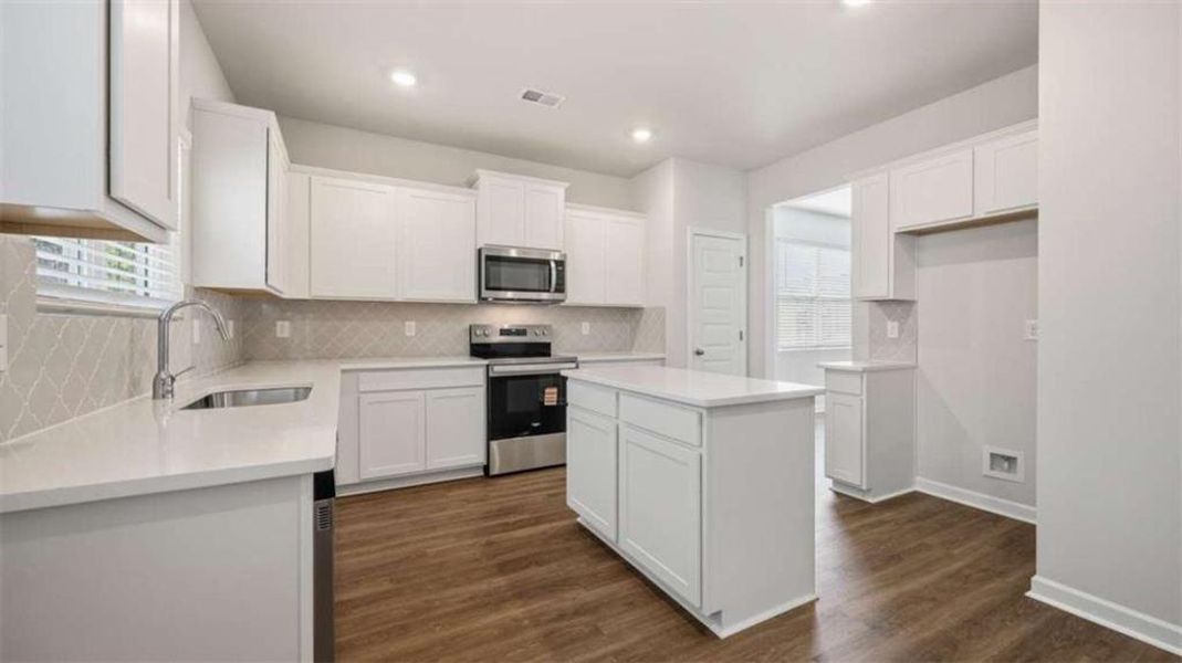 Furnished interior view inside a new home in Oakchase at Hampton, Hampton (Image 7).