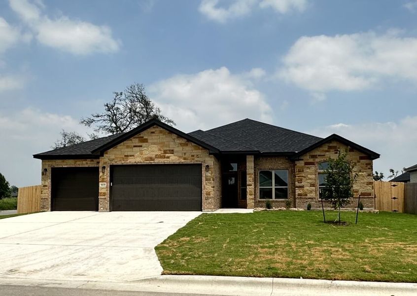 Representative exterior photo of a completed home built from the Nugget 3 car by Carothers Executive Homes in Eagle Heights, Salado, TX (Image 1). Representative exterior photo of a completed home built from the Nugget 3 car by Carothers Executive Homes in Eagle Heights, Salado, TX (Image 1).