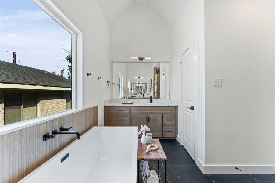 Additional vanity in primary bathroom.