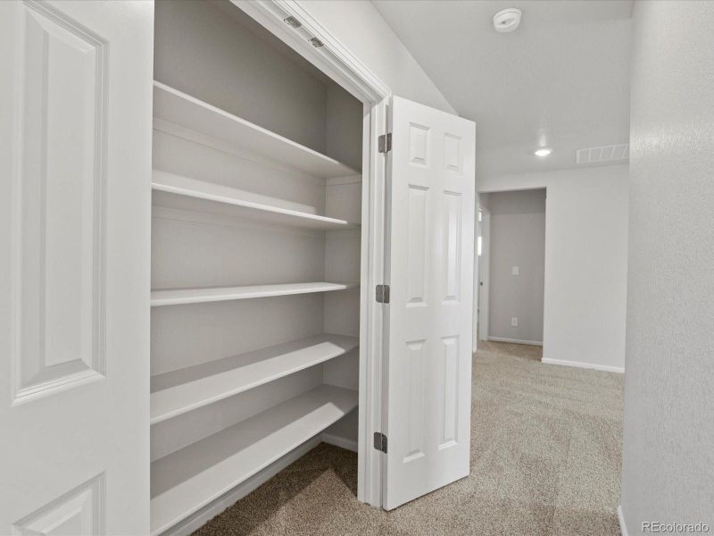 Furnished interior view inside a new home in Ridgeline Vista: The Flora Collection, Brighton (Image 14). Furnished interior view inside a new home in Ridgeline Vista: The Flora Collection, Brighton (Image 14).