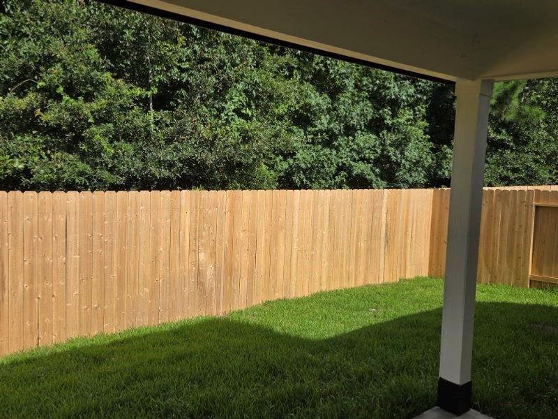 Exterior details and patio area of a home in River's Edge, Conroe (Image 4).