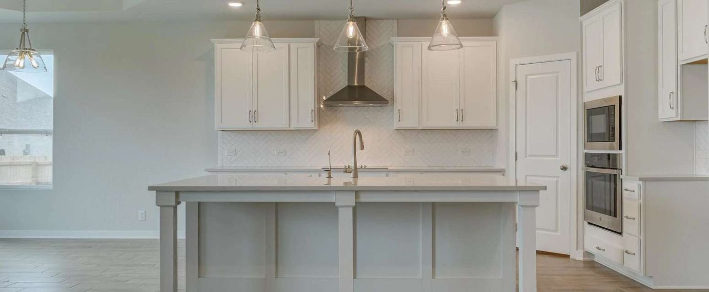Representative furnished interior of a home built from the Guadalupe by Ashton Woods in Saddlebrook Ranch, Schertz (Image 6).