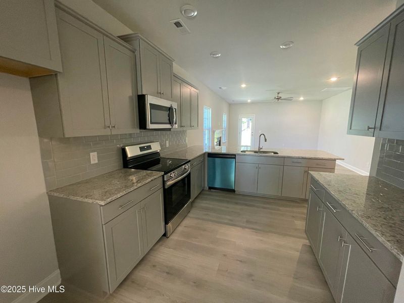 Furnished interior view inside a new home in Mill Creek Cove, Bolivia (Image 5). Furnished interior view inside a new home in Mill Creek Cove, Bolivia (Image 5).