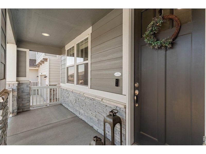 Exterior details and patio area of a home in Prairie Song, Windsor (Image 29).
