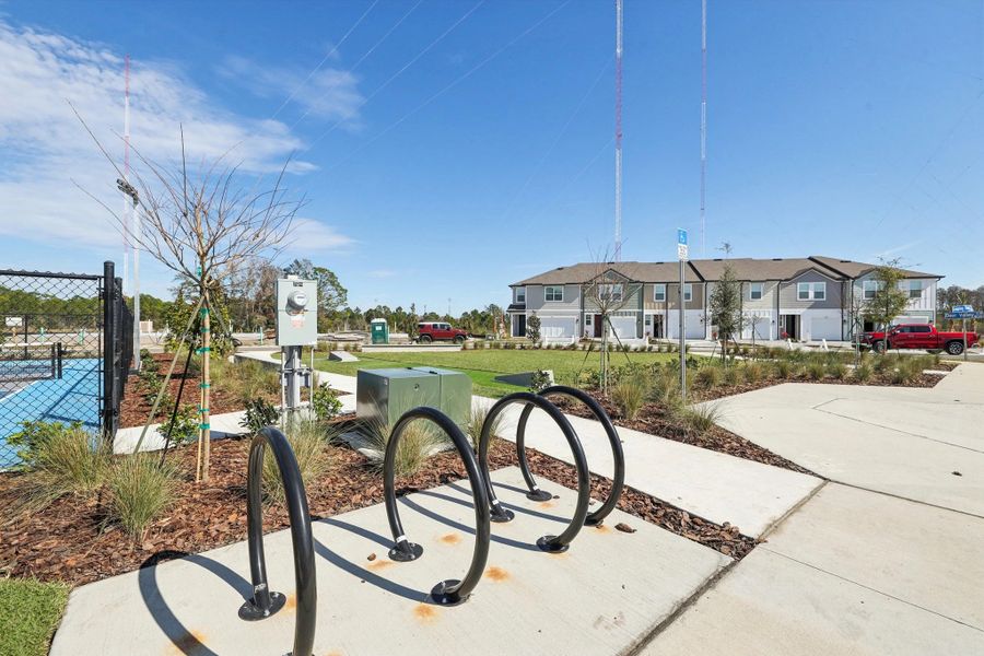 Enjoy a bike ride or casual stroll through the picturesque townhome community