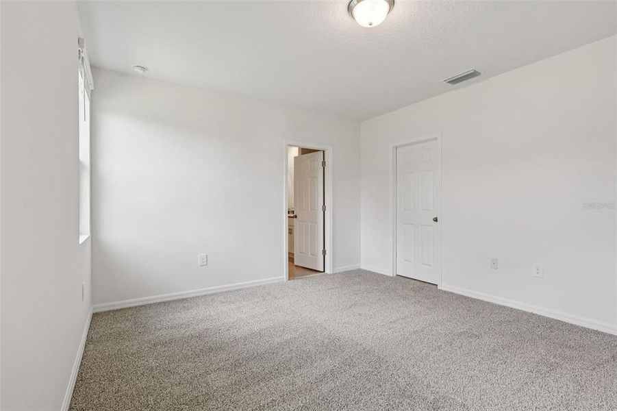 Spacious, unfurnished interior of a new home in Bradbury Creek - Signature Series, Haines City (Image 28).