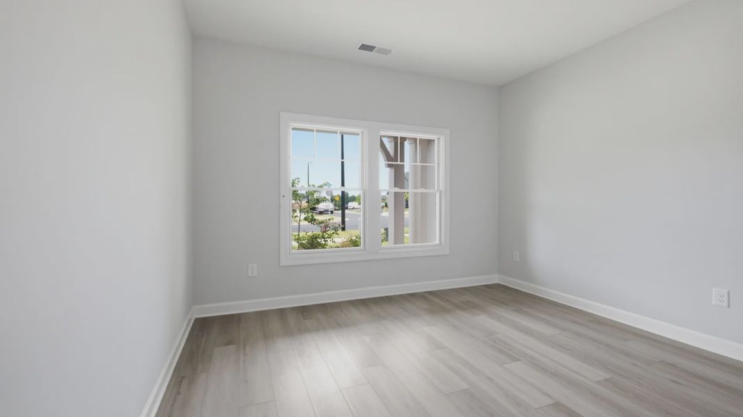 Spacious, unfurnished interior of a new home in The Courtyards at Oak Grove, Durham (Image 18).