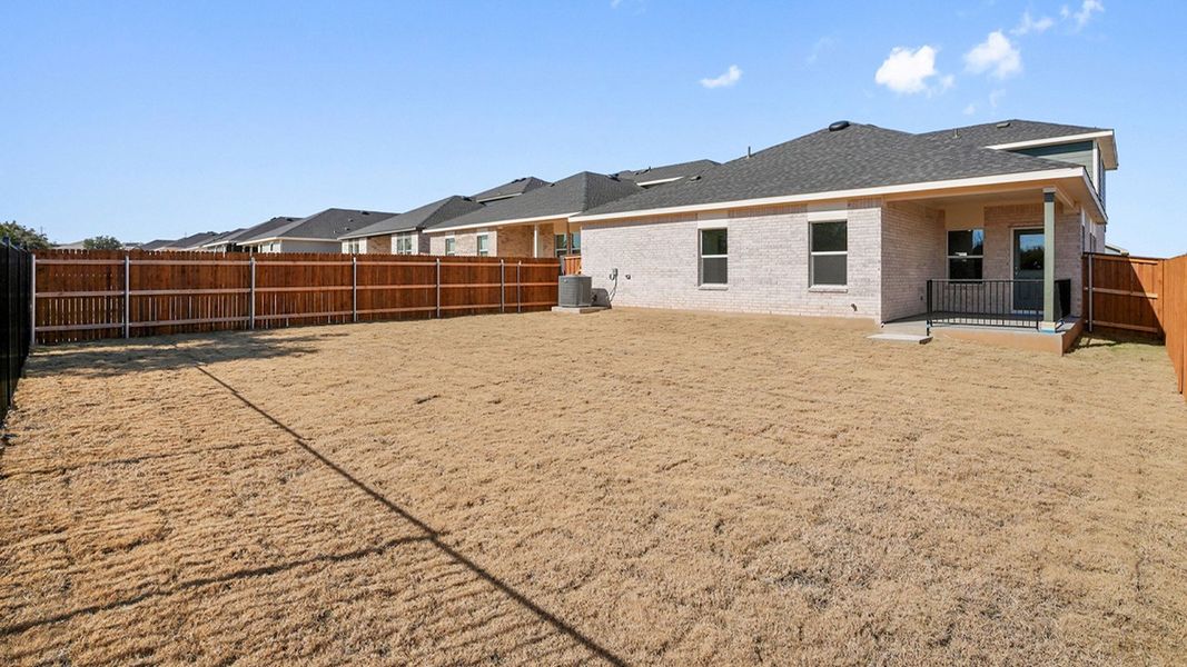 Exterior details and patio area of a home in Thunder Rock, Marble Falls (Image 19).