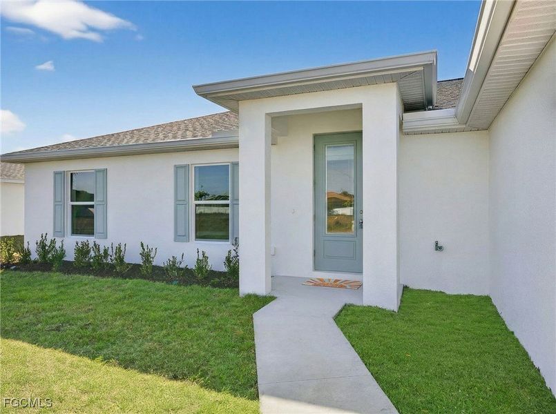 Exterior details and patio area of a home in Cape Coral, Cape Coral (Image 3).