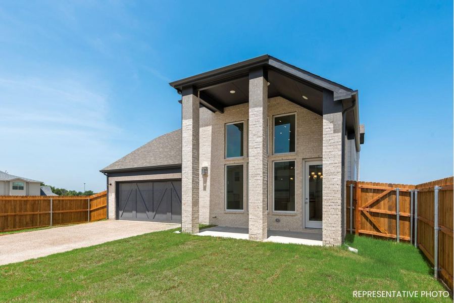 Representative exterior photo of a completed home built from the Royal Palm by Grand Homes in Trails at Cottonwood Creek, Rowlett, TX (Image 2).