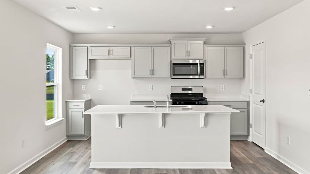 Furnished interior view inside a new home in Bentley Park, Greenwood (Image 7).
