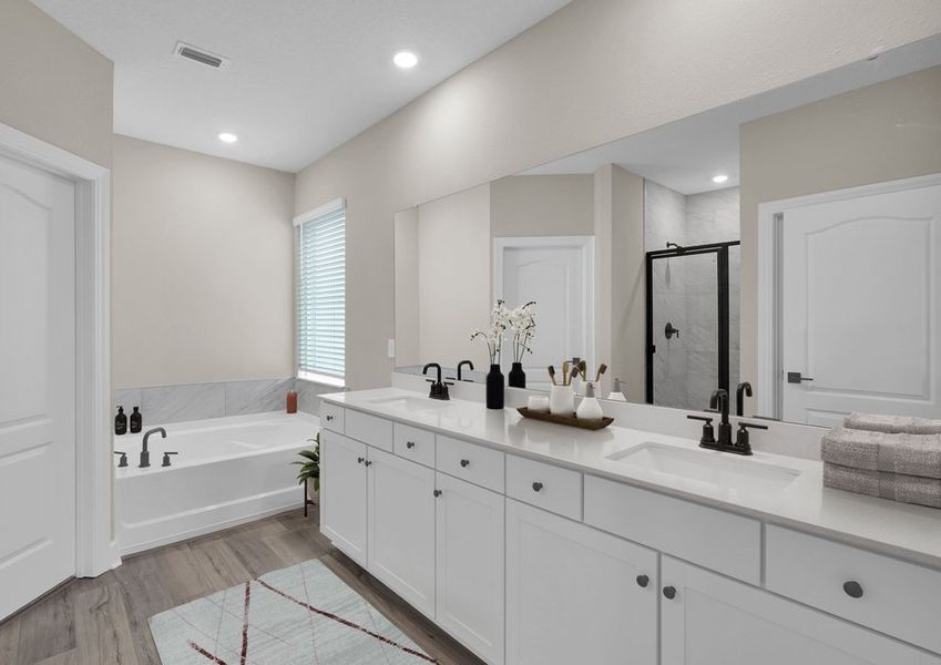 Get ready for your day in the master bathroom