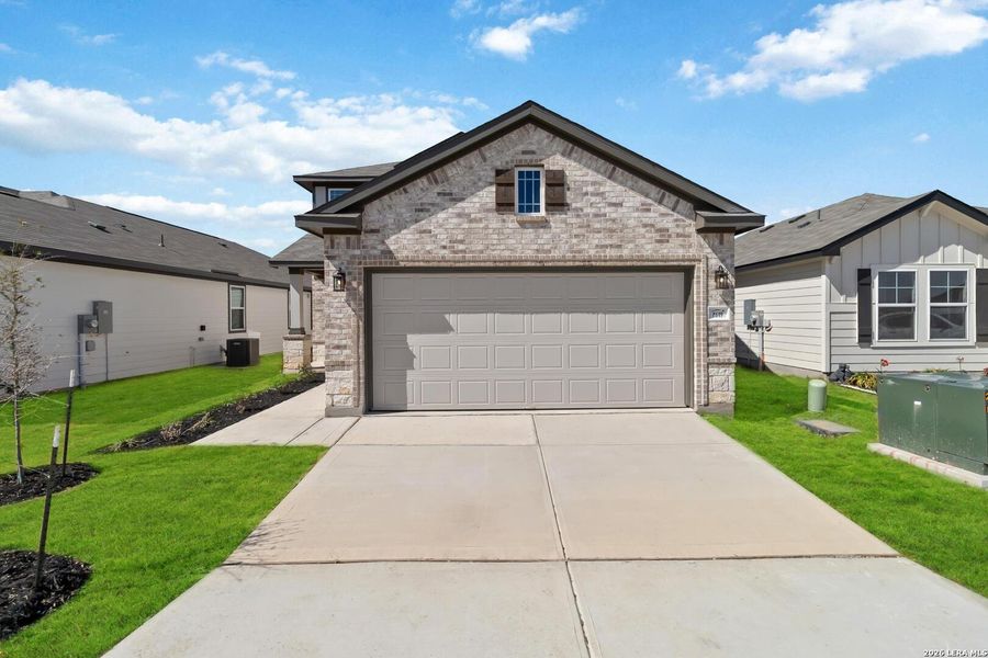 Front exterior of a new home in Red Hawk Landing, San Antonio, TX, highlighting curb appeal (Image 19).