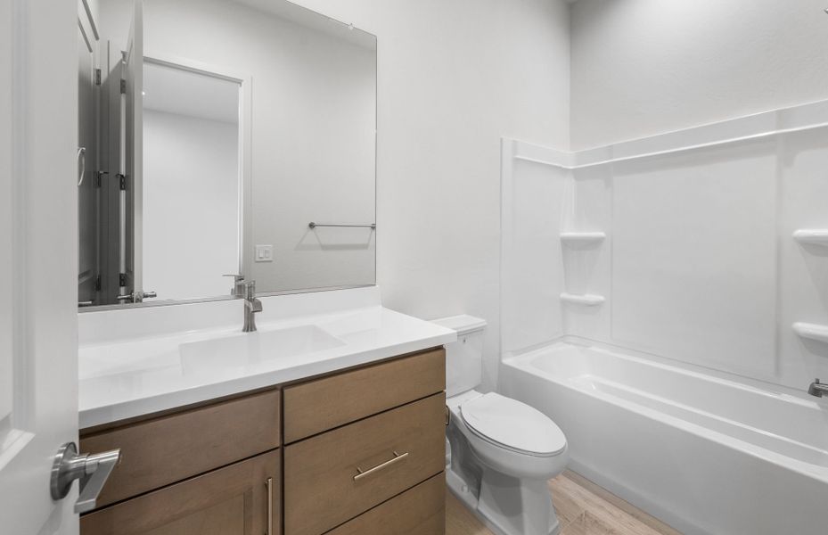 Furnished interior view inside a new home in Legado West, Queen Creek (Image 11).