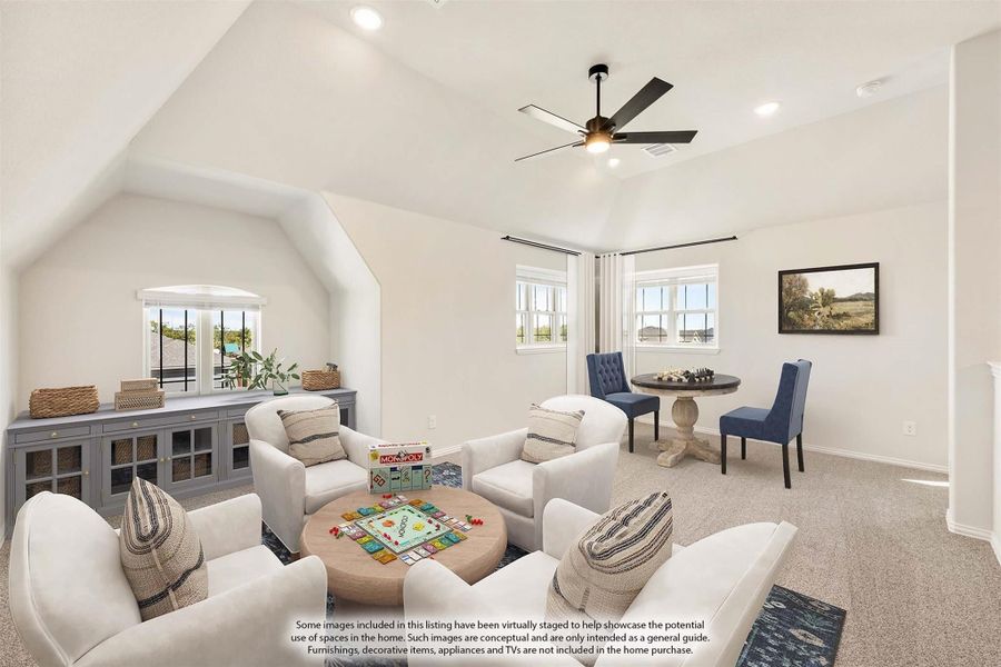 Bonus room with vaulted ceiling, ceiling fan, seating area, and game table on carpet flooring