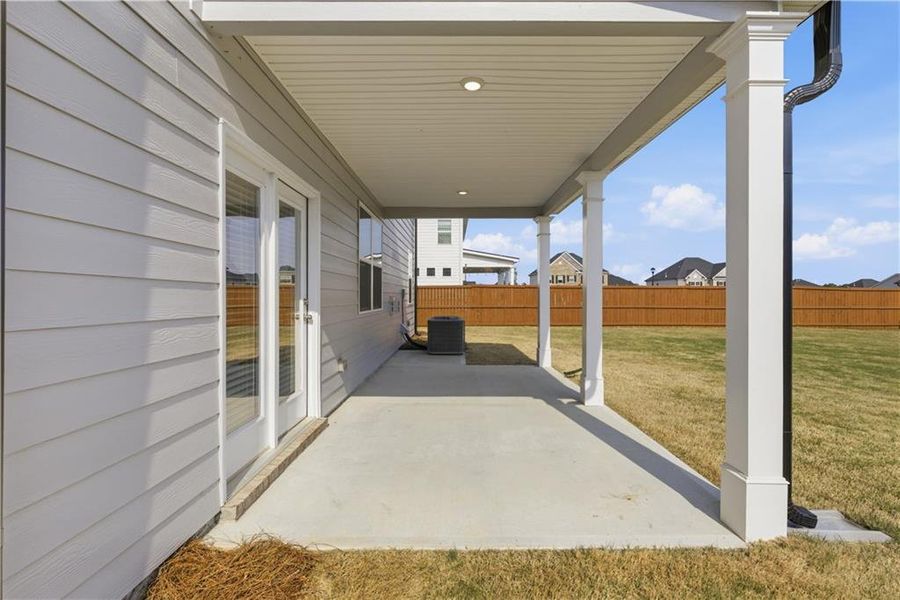 Exterior details and patio area of a home in Independence, Loganville (Image 29).