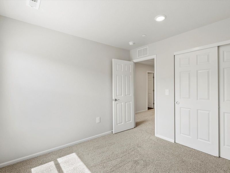 Spacious, unfurnished interior of a new home in Poudre Heights: The Meadow Collection, Windsor (Image 12).