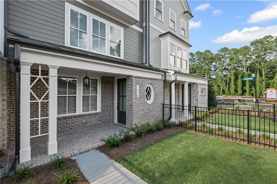 Exterior details and patio area of a home in Devin's Shire - A Kennesaw Tradition, Kennesaw (Image 4).