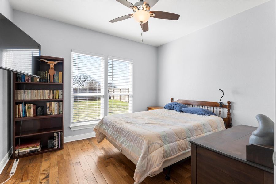 #3 Bedroom with hardwood / wood-style floors and ceiling fan
