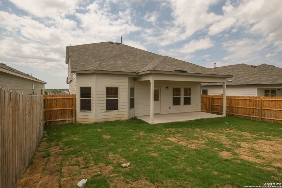 Front exterior of a new home in Hunters Ranch, San Antonio, TX, highlighting curb appeal (Image 23).