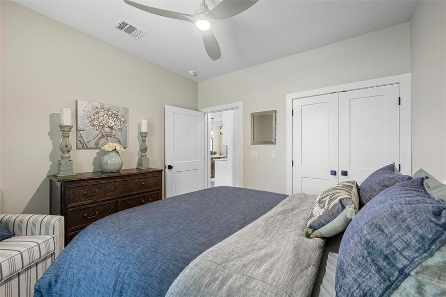 Bedroom with ceiling fan and a closet Bedroom with ceiling fan and a closet