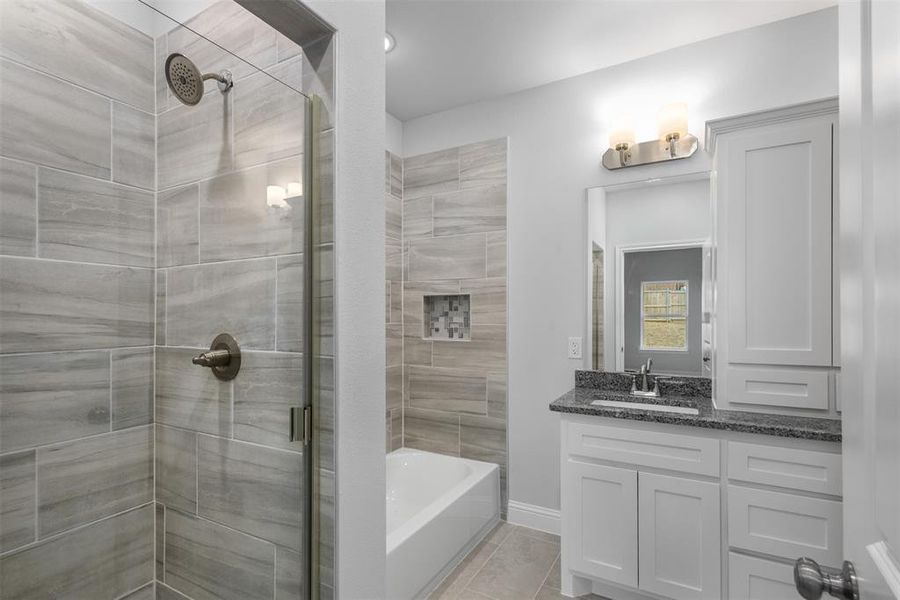 Gorgeous tiled showers!