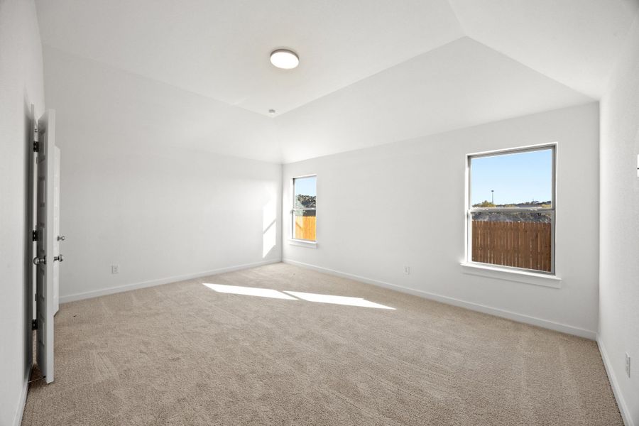 Primary Bedroom in the Turquoise home plan by Trophy Signature Homes – REPRESENTATIVE PHOTO