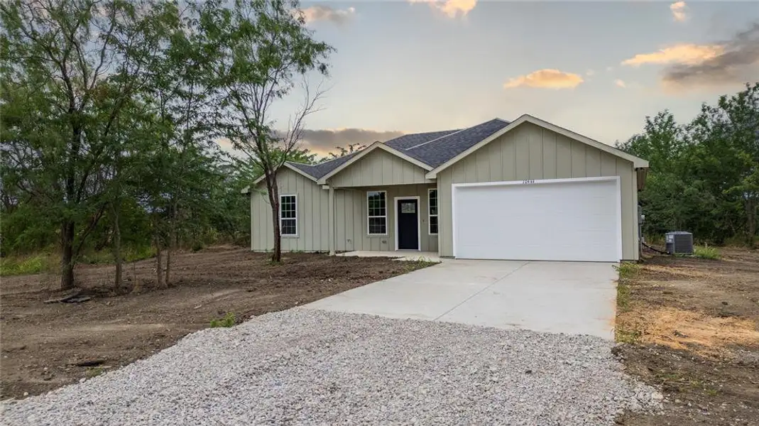 Front exterior of a new home in , Kaufman, TX, highlighting curb appeal (Image 2). Front exterior of a new home in , Kaufman, TX, highlighting curb appeal (Image 2).