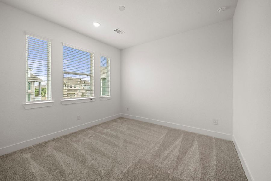 Spacious, unfurnished interior of a new home in Bridgeland, Cypress (Image 21).