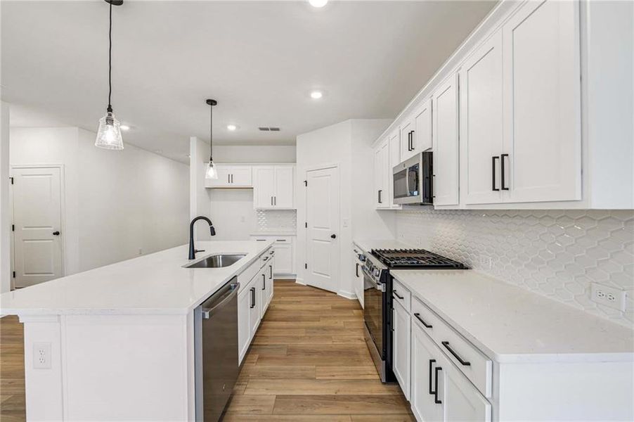 Furnished interior view inside a new home in Eastlyn Crossing, Flowery Branch (Image 9).