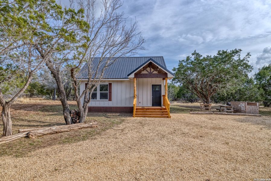 Exterior details and patio area of a home in , Uvalde (Image 9).
