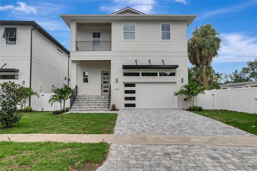 Front exterior of a new home in , Tampa, FL, highlighting curb appeal (Image 2). Front exterior of a new home in , Tampa, FL, highlighting curb appeal (Image 2).