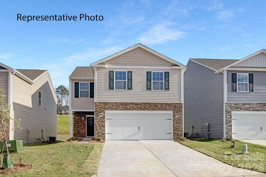 Front exterior of a new home in Fergus Crossing, York, SC, highlighting curb appeal (Image 1). Front exterior of a new home in Fergus Crossing, York, SC, highlighting curb appeal (Image 1).