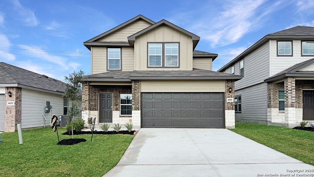 Front exterior of a new home in Stonehill, San Antonio, TX, highlighting curb appeal (Image 2). Front exterior of a new home in Stonehill, San Antonio, TX, highlighting curb appeal (Image 2).