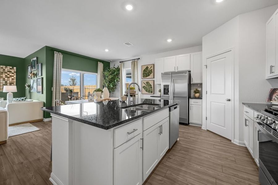 Representative furnished interior of a home built from the Robin by Taylor Morrison in Longview 50s, Del Valle (Image 5).