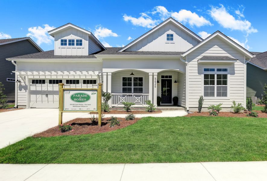 Representative exterior photo of a completed home built from the Lanai by Bill Clark Homes in Sidbury Landing, Wilmington, NC (Image 31). Representative exterior photo of a completed home built from the Lanai by Bill Clark Homes in Sidbury Landing, Wilmington, NC (Image 31).