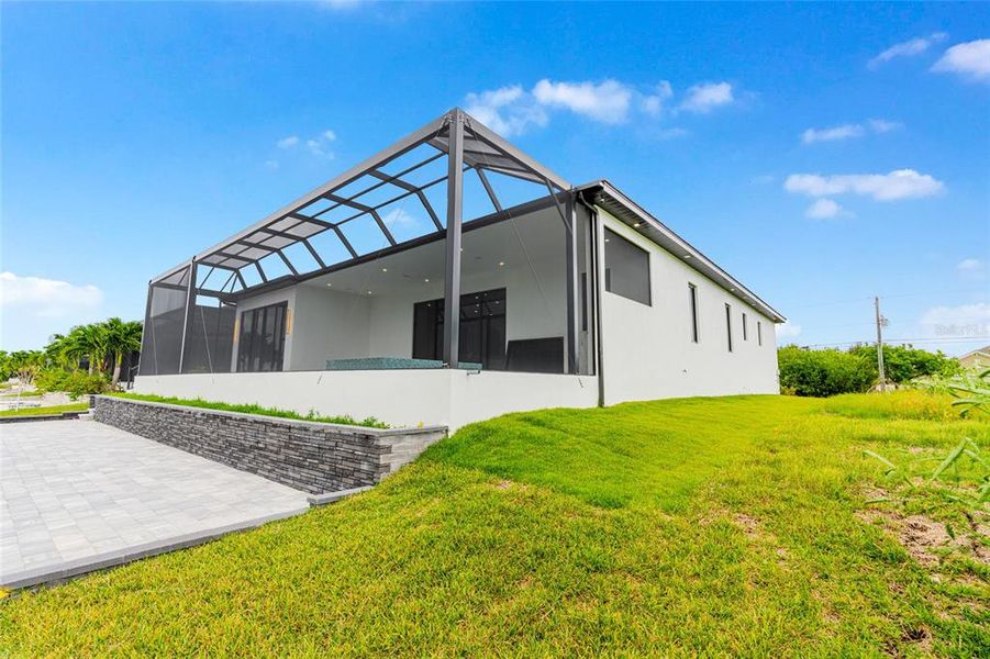 Exterior details and patio area of a home in , Port Charlotte (Image 36).