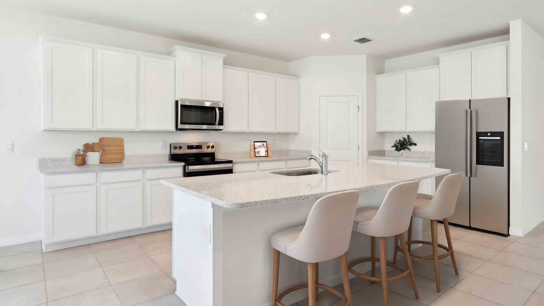 Representative furnished interior of a home built from the Hawthorne by D.R. Horton in Ocala Preserve, Ocala (Image 2).