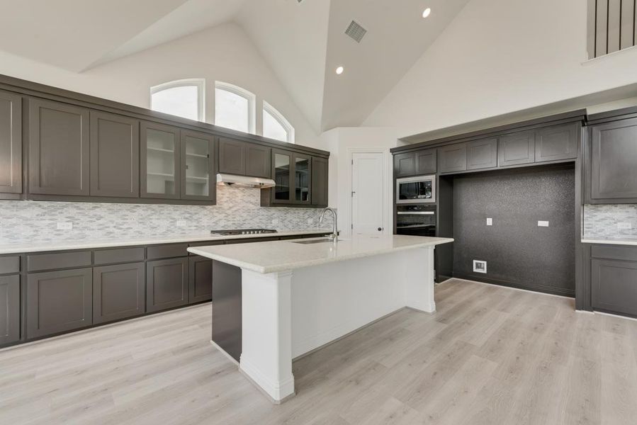 Furnished interior view inside a new home in Dominion of Pleasant Valley, Wylie (Image 11).